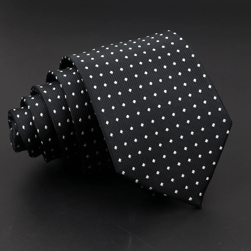 Black Polka Dot Talisman Necktie – A Sophisticated Essential for Every Gentleman
