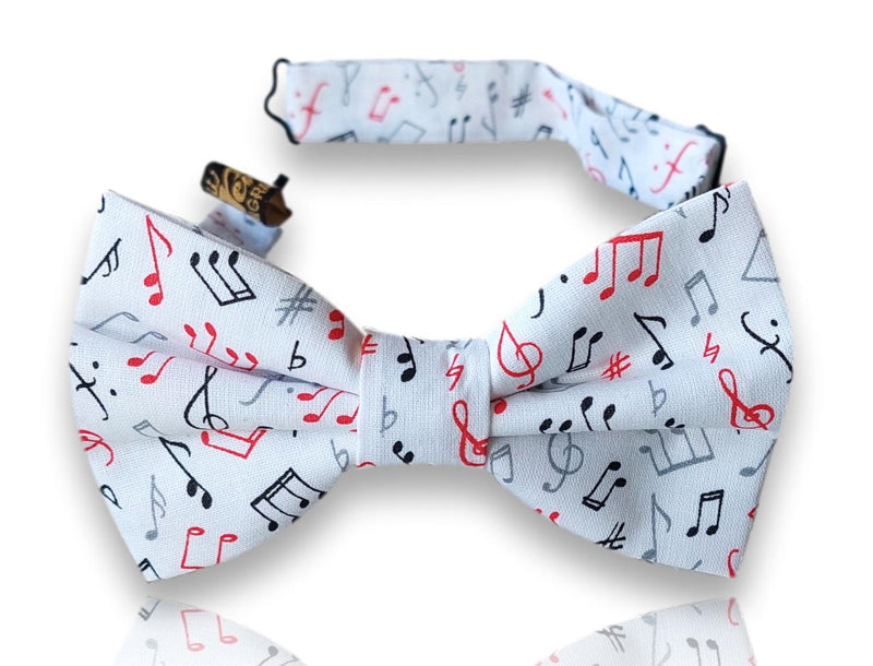Corella white silk bow tie with red and black musical notes