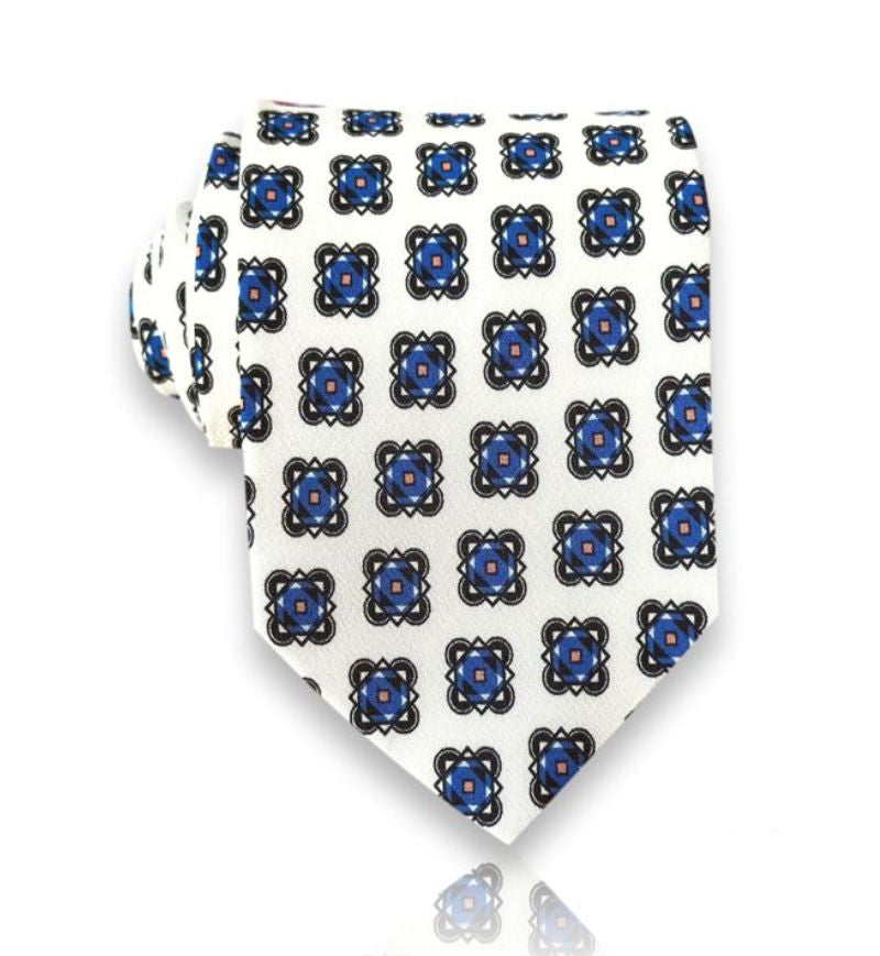 Ivory navy medallion silk tie flat view