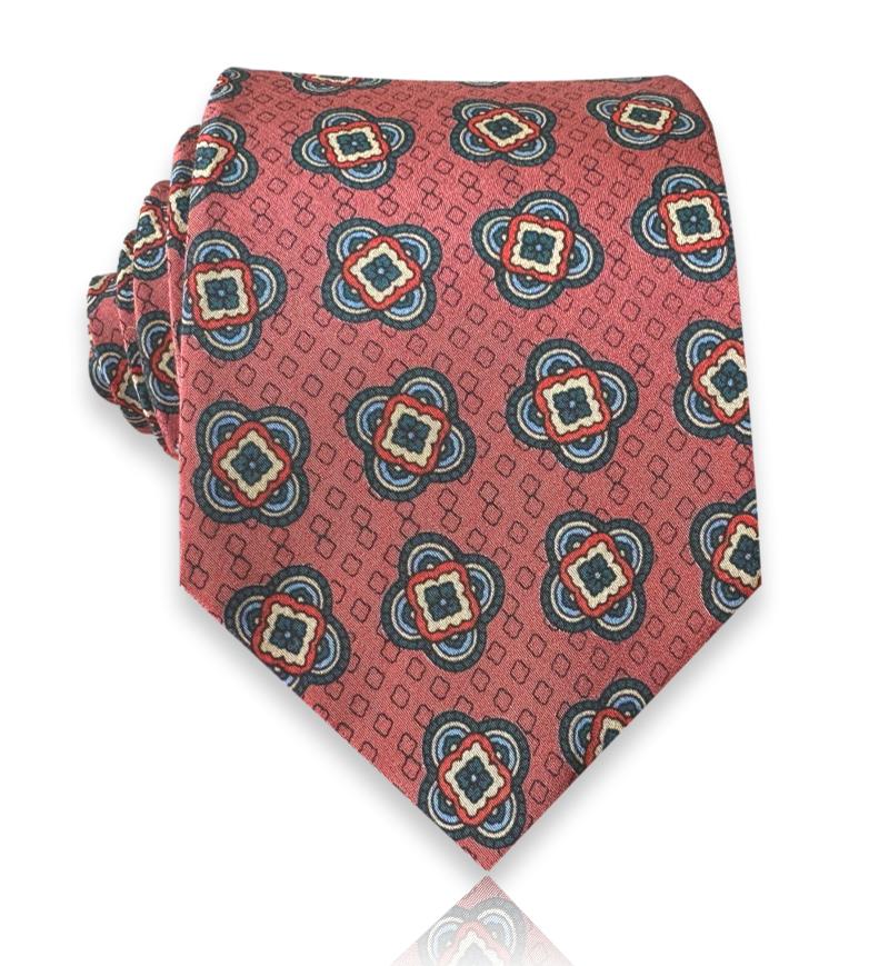 Coral silk tie with quatrefoil medallion foulard pattern