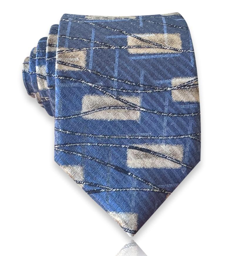 Denim blue silk tie with abstract mosaic pattern