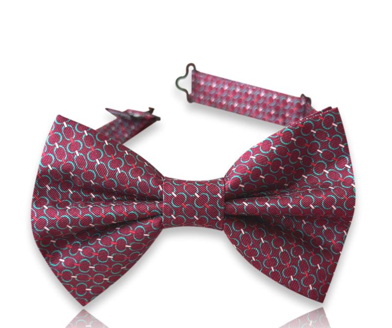 Crimson silk bow tie with ivory chain motifs
